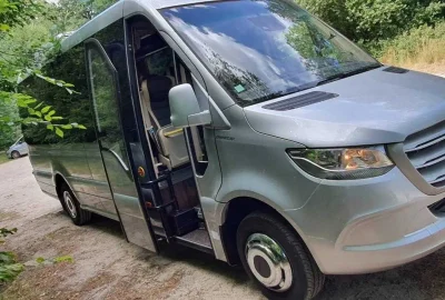 Exterior of a Mercedes Sprinter bus with a sleek and modern design.